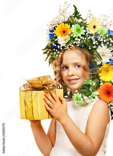 Photo: Child with gift box and flower. Child with gift box and flower.