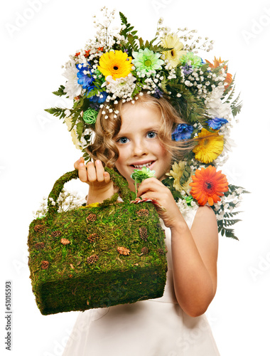Photo: Child with gift box and flower. Child with gift box and flower.