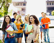 Group Student With Notebook Ou...