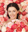 Foto: woman with background full of roses woman with background full of roses