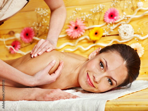 Photo: Woman getting massage . Woman getting massage .