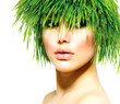Beauty Spring Woman with Fresh Green Grass Hair. Summer Nature