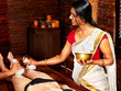 Woman Having Ayurvedic Feet Sp...