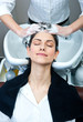 attractive woman washing her hair