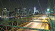 Time lapse of city traffic on Brooklyn bridge at evening