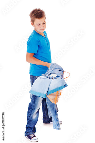 Photo: Boy catching denim clothes Boy catching denim clothes
