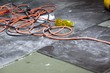 coils of electrical cable lying on floor workplace