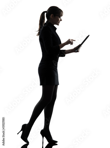 Photo: business woman walking computer computing typing digital table business woman walking computer computing typing digital table