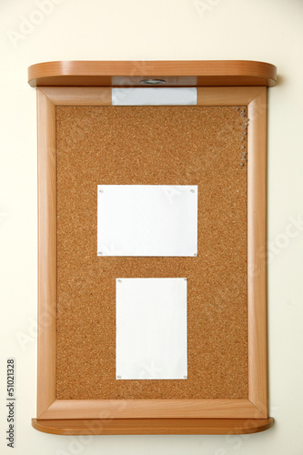 Photo: note paper pined on cork board background note paper pined on cork board background