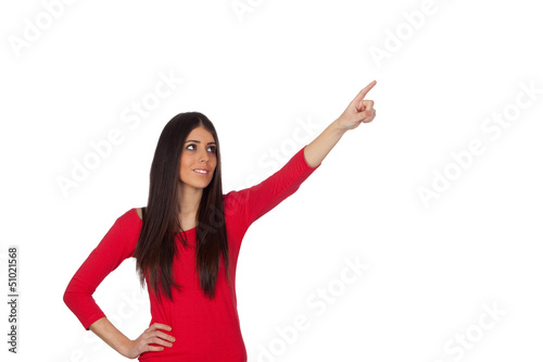 Photo: Brunette girl pointing something with her finger Brunette girl pointing something with her finger