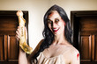 Thankful zombie businesswoman with bonus