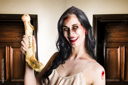 Photo: Thankful zombie businesswoman with bonus Thankful zombie businesswoman with bonus