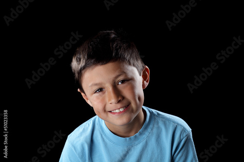 Photo: Smiling boy on black background Smiling boy on black background