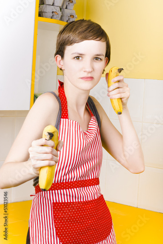 Photo: Dietician shooting banana guns in kitchen Dietician shooting banana guns in kitchen