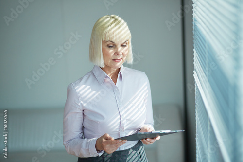 Photo: Mature secretary Mature secretary