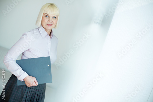 Photo: Woman with document Woman with document