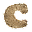 letter clipped from linen fabric