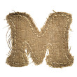 letter clipped from linen fabric