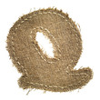 letter clipped from linen fabric