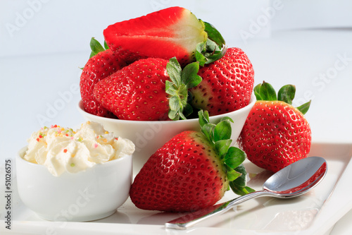 Photo: Dessert, fresh strawberries and whipped cream Dessert, fresh strawberries and whipped cream