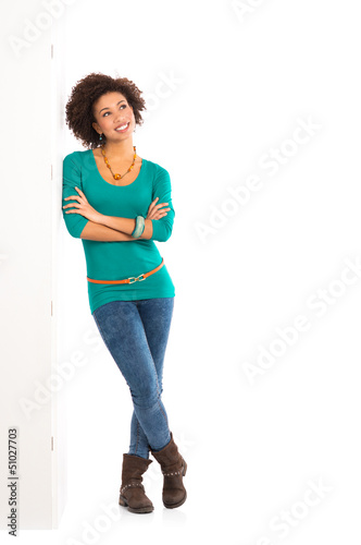 Photo: Thoughtful Woman Leaning On Wall Thoughtful Woman Leaning On Wall
