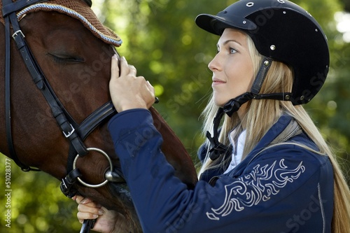Photo: Friendship between rider and horse Friendship between rider and horse