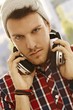 Closeup portrait of young man with headphones