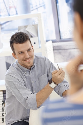 Photo: Portrait of happy office worker Portrait of happy office worker