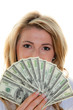 Foto: Dollar Geldscheine und Frau Dollar Geldscheine und Frau