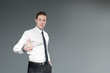 Businessman with thumbs up.