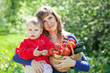  woman and baby girl with vegetables harvest