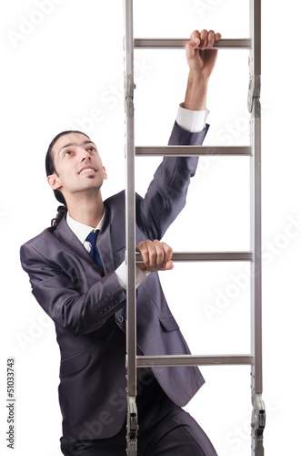 Photo: Businessman climbing the ladder isolated on white Businessman climbing the ladder isolated on white