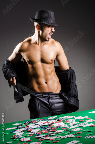 Photo: Naked broke businessman in casino Naked broke businessman in casino