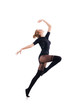Young woman dancing on white background