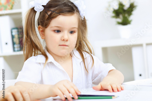 Photo: Mother and daughter studying Mother and daughter studying