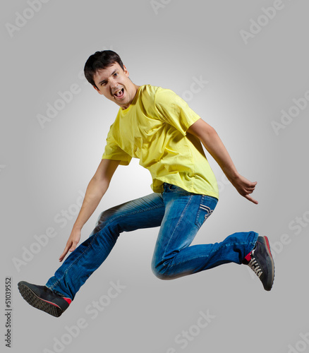 Photo: Young man dancing and jumping Young man dancing and jumping