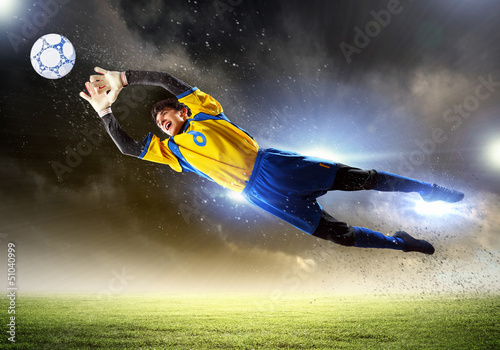 Photo: Goalkeeper catches the ball Goalkeeper catches the ball