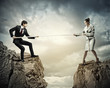 People pull the rope.