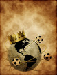 Soccer ball with crown and globe on the old texture