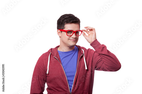 Photo: Smiling male hipster student at white background Smiling male hipster student at white background