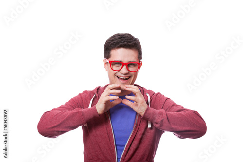 Photo: Smiling male hipster student at white background Smiling male hipster student at white background