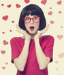 girl in red glasses at white background.