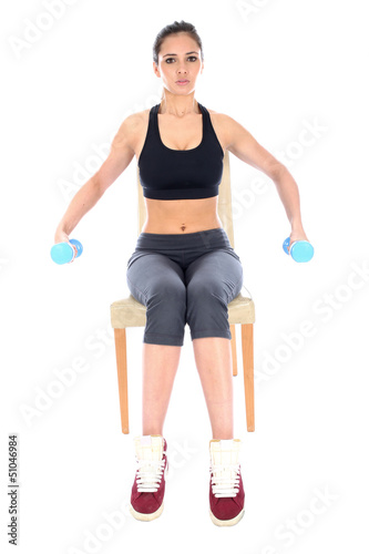 Photo: Young Woman Exercising Young Woman Exercising