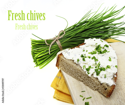 Photo: a slice of bread with cheese and chives a slice of bread with cheese and chives