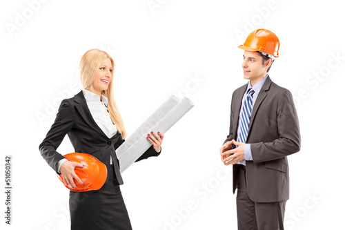 Photo: Female architect and investor having a conversation Female architect and investor having a conversation