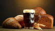 tankard of kvass and rye breads with ears,