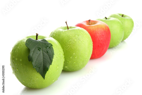 Photo: Ripe green apples and one red apple isolated on white Ripe green apples and one red apple isolated on white