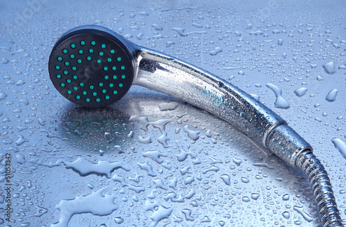 Photo: Shower and drops, on blue background Shower and drops, on blue background