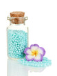 Little bottle full with colorful beads isolated on white
