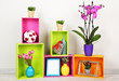 Beautiful colorful shelves with different home related objects